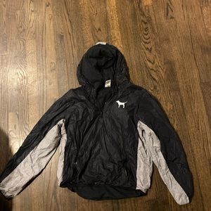 black and grey windbreaker